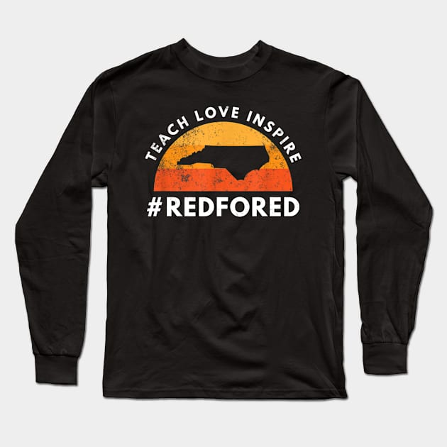 Teach Love Inspire Red For Ed T-Shirt North Carolina Teacher Long Sleeve T-Shirt by Vicenta Aryl